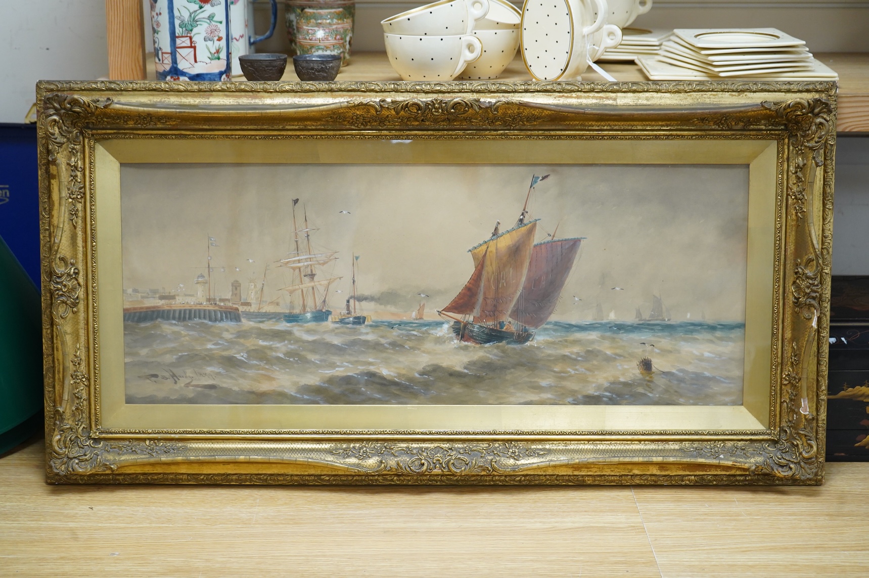 Thomas Bush Hardy (1842-1897), Maritime scene with ships before a lighthouse, dated 1889, watercolour heightened with white, 29 x 75cm, ornate gilt frame